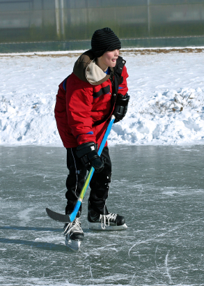 Hockey player on frozen pond