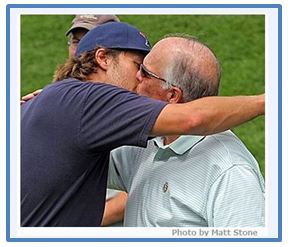 Tom Brady and Tom Brady, Sr. embracing