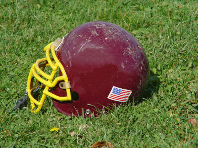 Scuffed up used football helmet