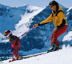Father and son skiing