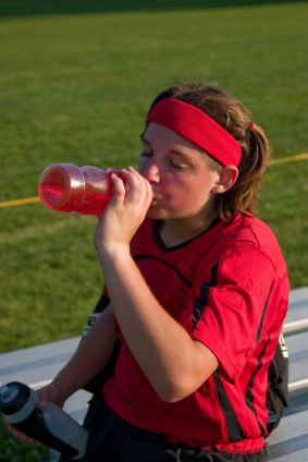 Overheated soccer player rehydrating