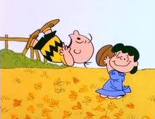 Lucy pulls football away from Charlie Brown again